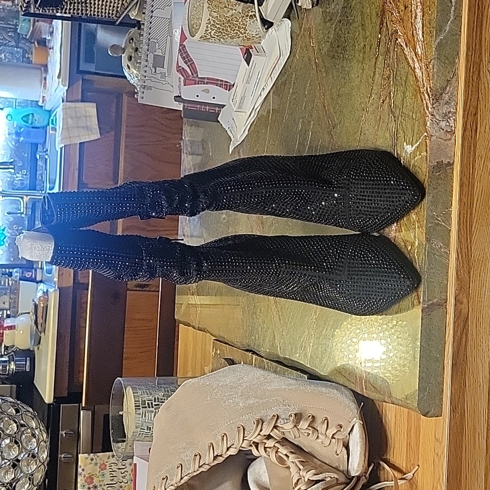 Brand new without tag size 8M black gem bedazzled boots.